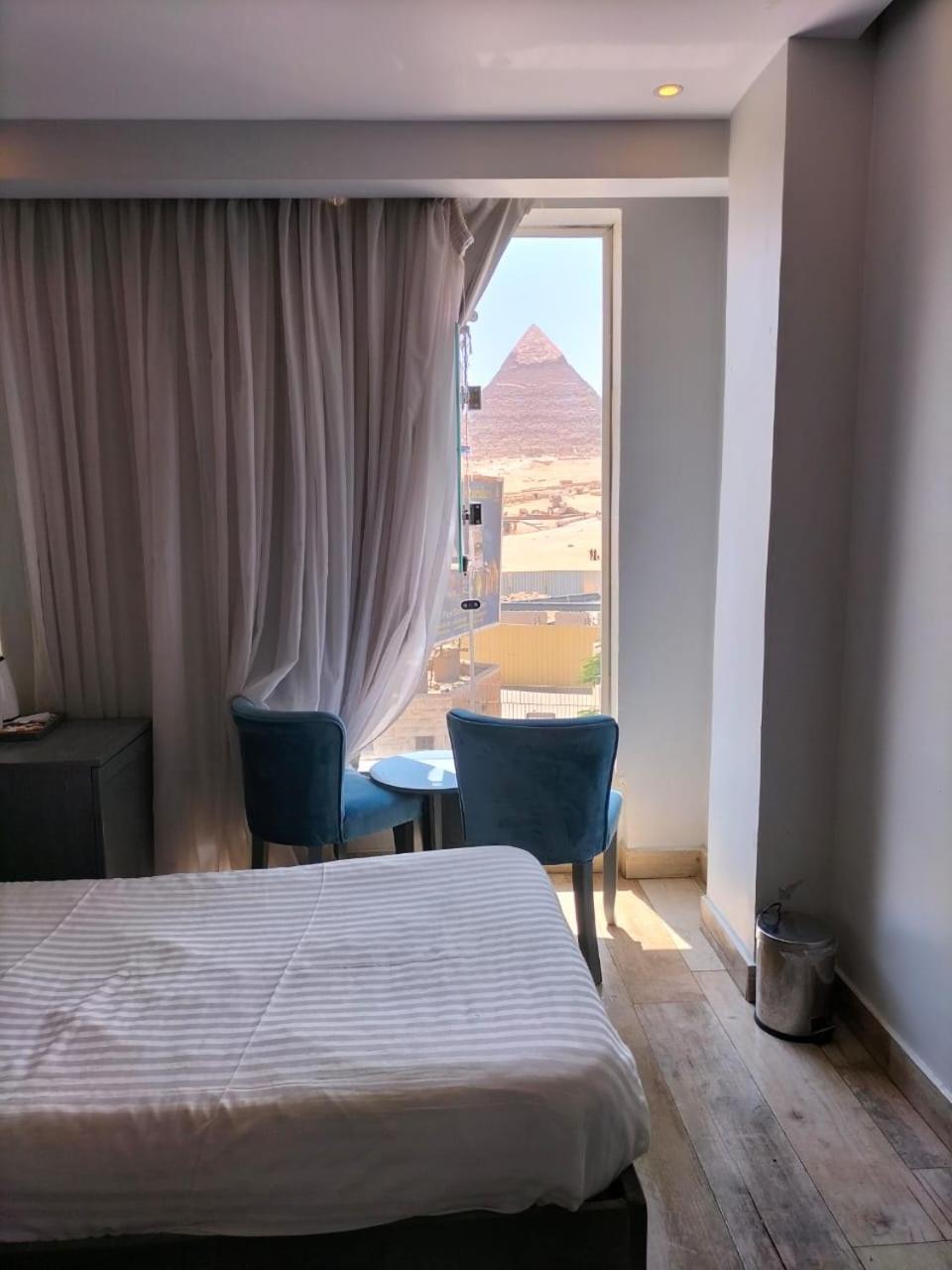 Pyramids Show Hotel Kafret el-Gabal Exterior foto